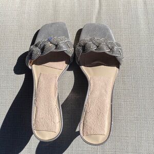Slip on glittery slides…